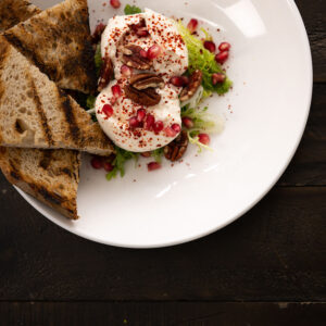 Burrata cheese with pecans and pomegranate